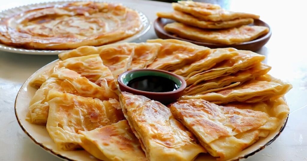 Top 10 Must-Try Egyptian Dishes for First-Time Visitors 5 Feteer Meshaltet: Flaky Egyptian Pie